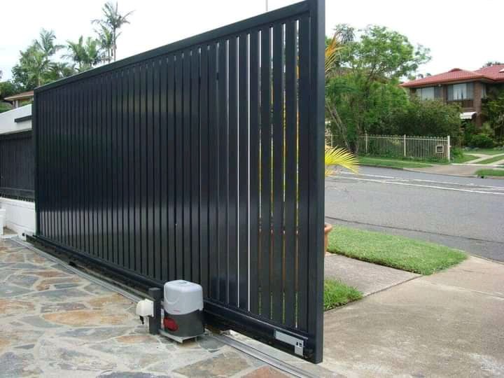 Automated sliding steel gate with motor installation