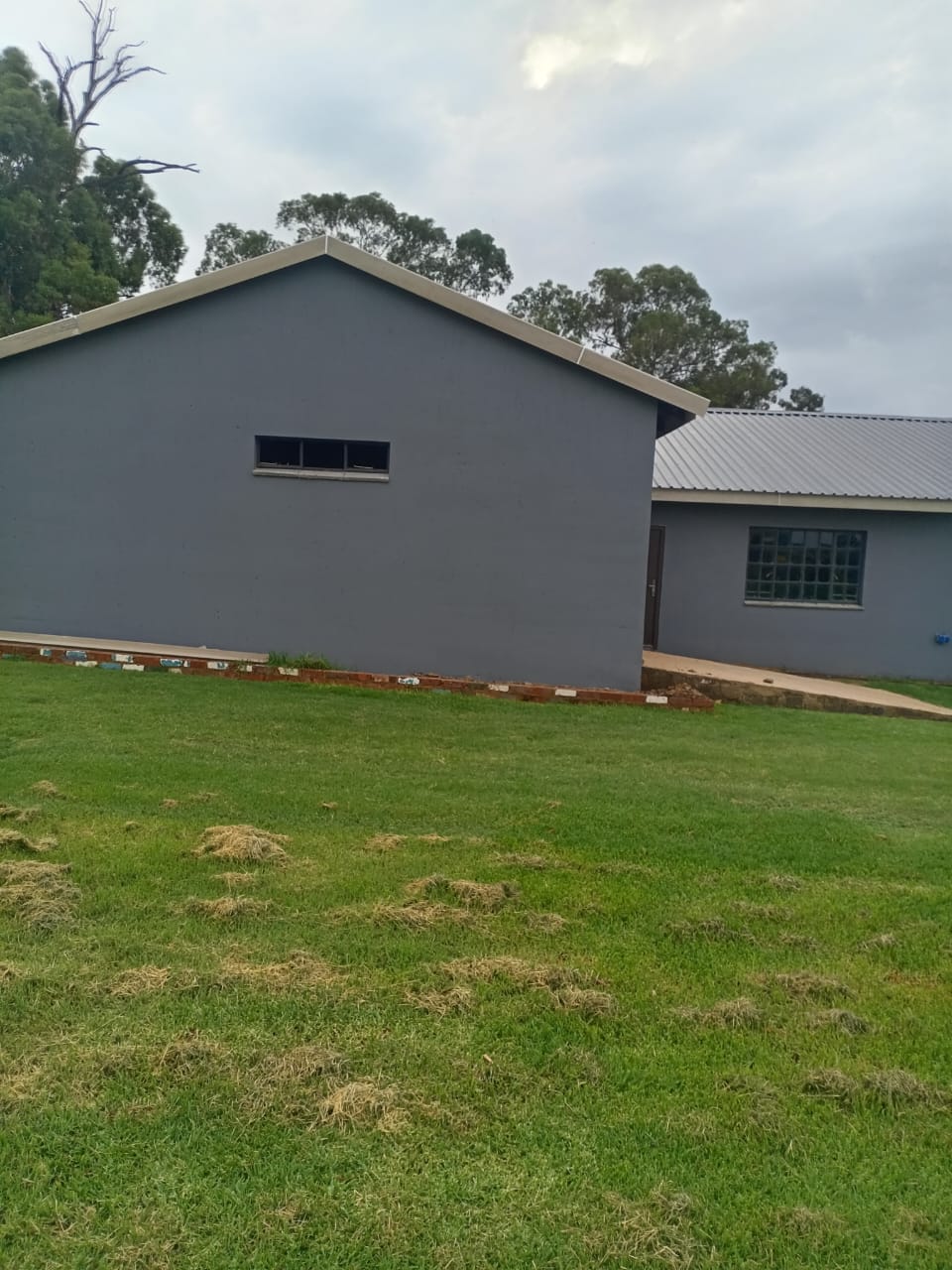 Completed double-storey new build with plastered finish